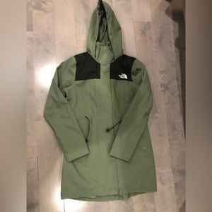 Small Northface rain jacket in forest green, perfect for fall and rainy days!